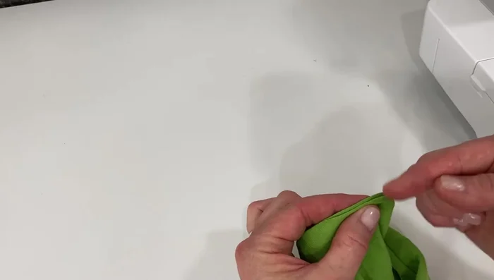 Close the opening using a whip stitch or top stitching.