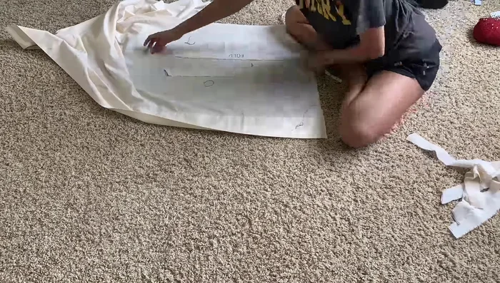 Attach sleeves to the dress, aligning seams.