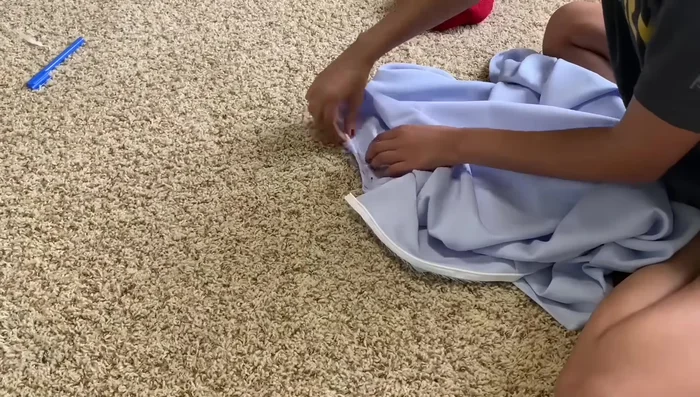 Attach sleeves to the dress, aligning seams.