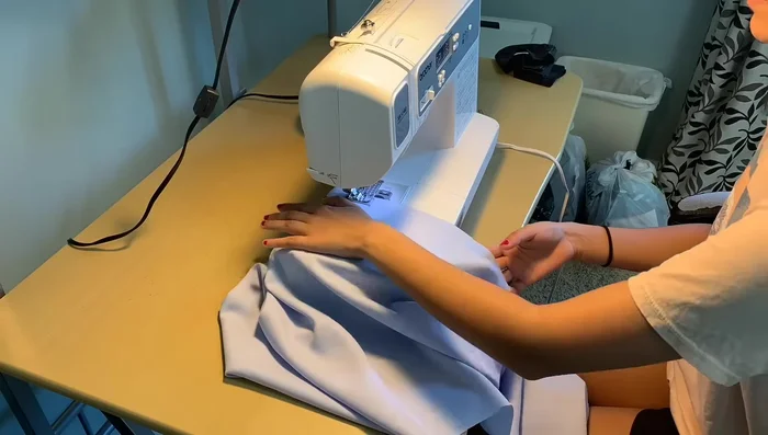 Apply a basting stitch to the bottom of the skirt.