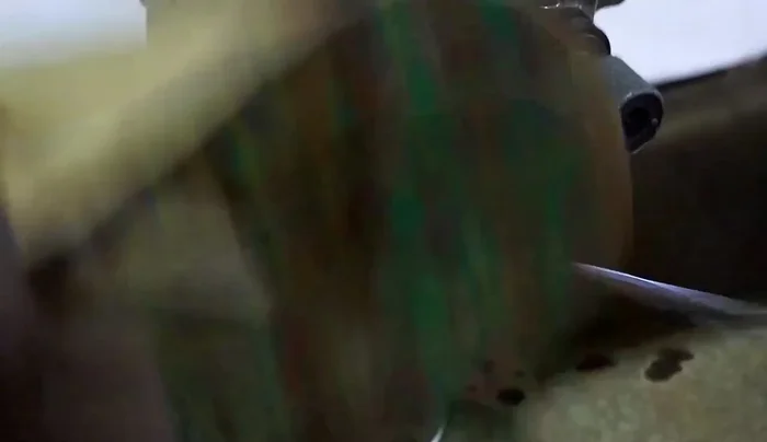 Prepare the African print fabric by cutting it to the appropriate size for the tassels. The exact dimensions aren't specified, but it should be large enough to cover the tassels and have some extra for wrapping.