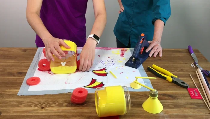 Use Sugru (moldable waterproof glue) to attach the remaining embellishments. Allow 24 hours to cure.