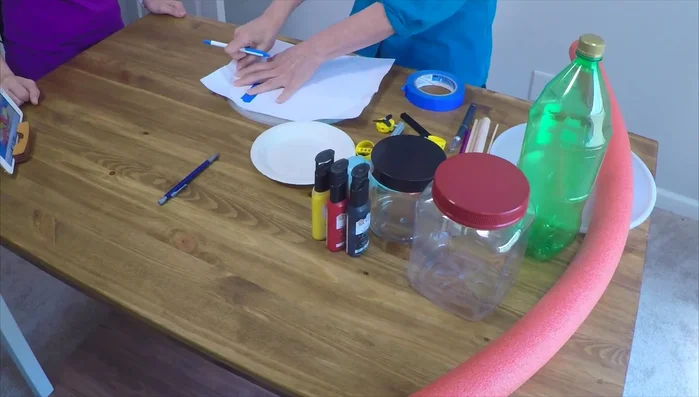 Attach the Mickey charm to the front of the sub.