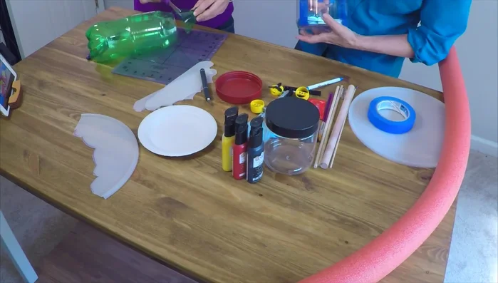 Paint the inside of the larger container and the cone. Note: Use waterproof paint if painting the exterior.