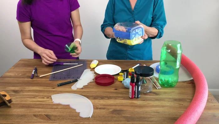 Paint the inside of the larger container and the cone. Note: Use waterproof paint if painting the exterior.