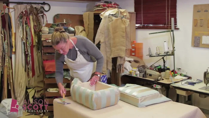 Add optional piping around corners (if applicable) by back tacking it in place before covering with the side fabric.