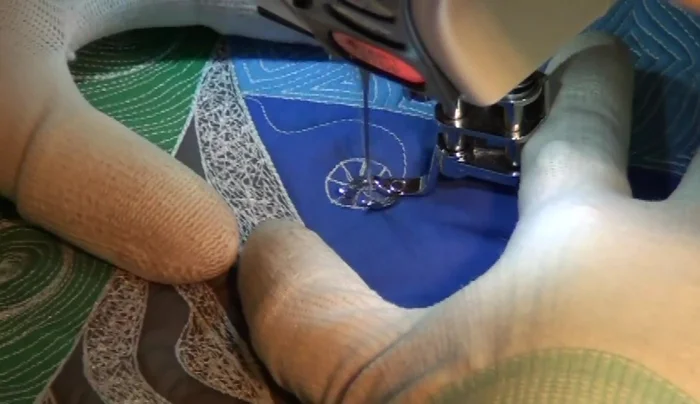 Do some travel stitching to enhance the star and create texture.