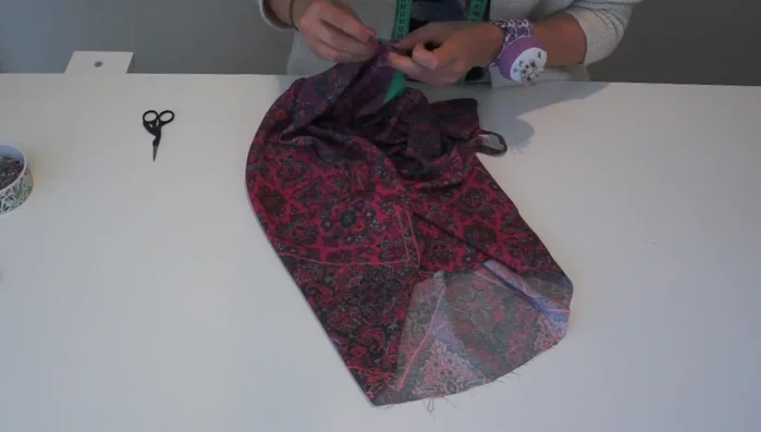 Final stitch: Top stitch around the entire neckline and shoulder seams to secure straps and provide a polished finish.