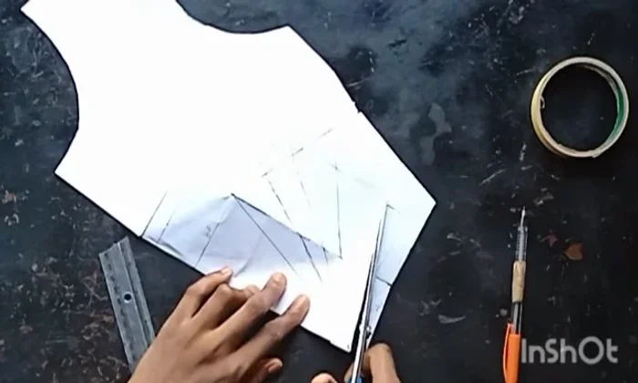 Cut along the style lines to slash and spread the pattern.