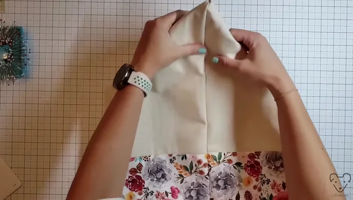 Create boxed corners: Flip the bag upside down. Mark 2 ½ inch lines from the bottom corners to create boxed corners. Sew along the marked lines, trim excess, and flip right-side out.