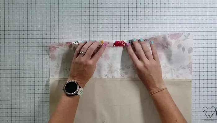Press down the top 18-inch edge ½ inch towards the wrong side, then fold and press again 1 ½ inches for a clean, reinforced top edge. Repeat for the opposite side.