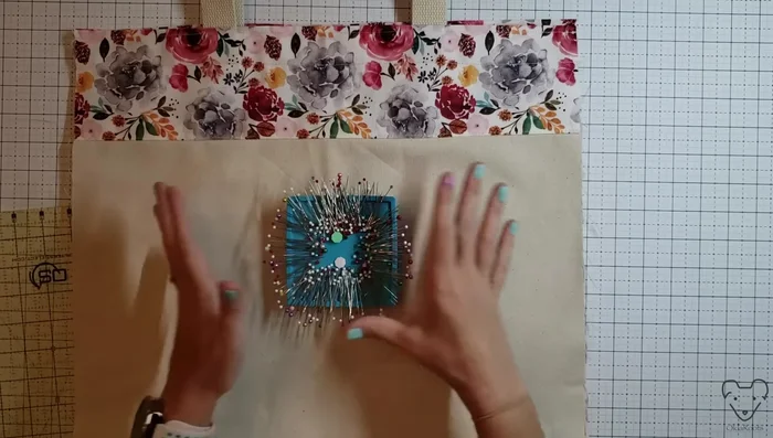 Pin and sew side seams: Pin the side seams together (lining and outer fabric), ensuring the top edges are aligned. Sew with a ¼ inch seam allowance. Turn inside out.