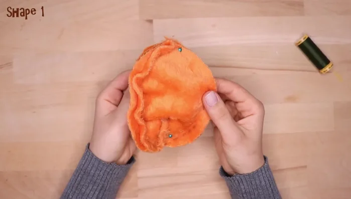 Sew along the lines, leaving a small opening at the top.