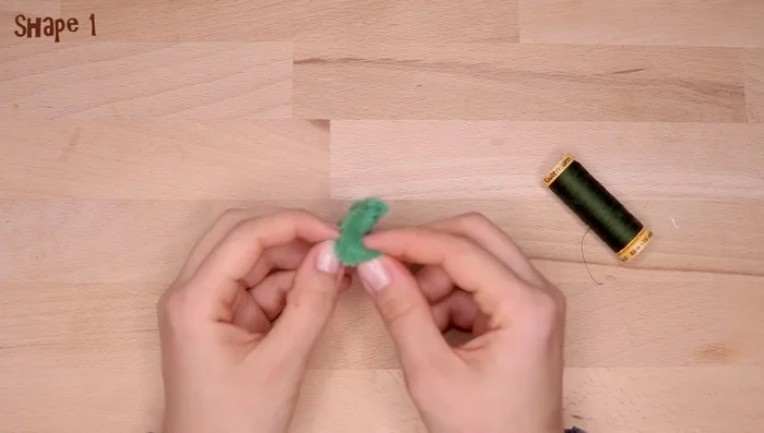 Place it on top of the pumpkin and sew in place.