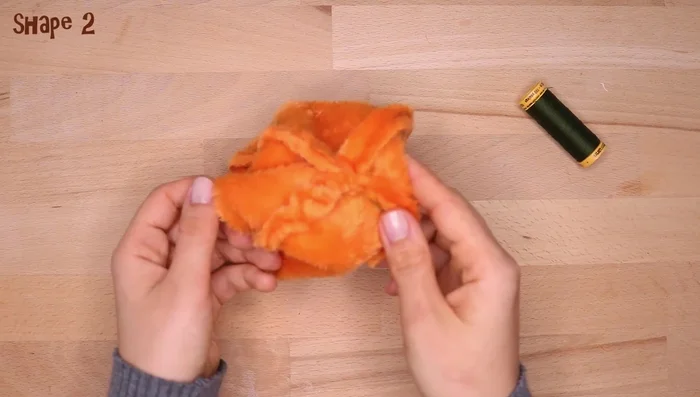 Turn the plushy inside out.