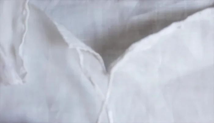 Add neckties (optional): Create small tabs and sew neckties to them for reinforcement and comfort.