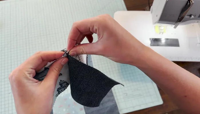 Assemble rows: Pin and sew the blocks within each row together, ensuring seams align. Press the seams.