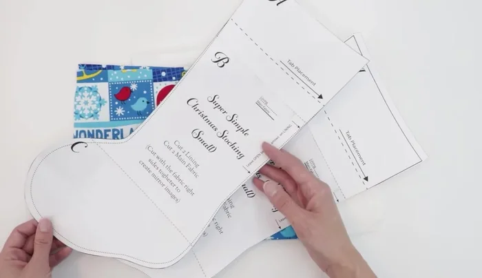 Place the main fabric pieces right sides together, ensuring the fabric direction is correct. Trace or pin the pattern onto the fabric and cut out.