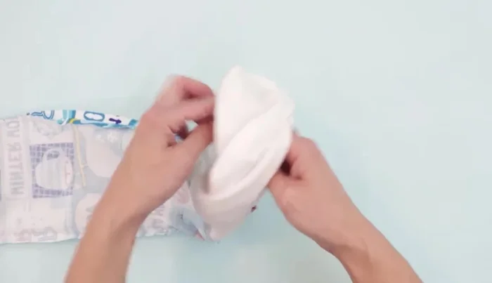 Sew the lining opening closed using a slip stitch or a very small machine stitch (1/8 or 1/16 inch). Press or finger press flat.