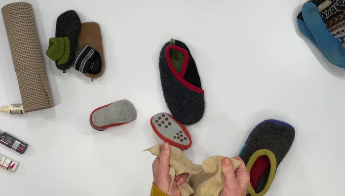 Cut out a sole piece from suede fabric using the non-slip side.