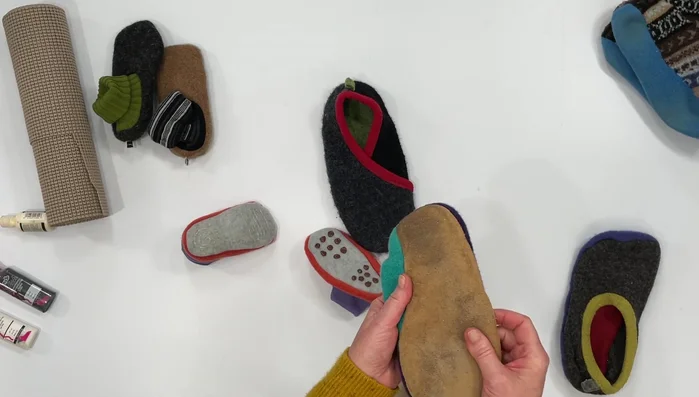 Sew the suede sole onto the slipper.