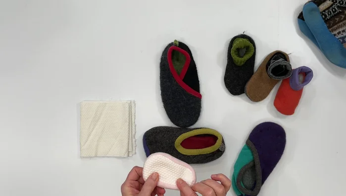 Cut out a sole piece matching the slipper's sole.