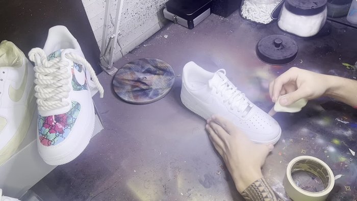 Prepare the leather: Cut a piece of leather slightly larger than your taped area.