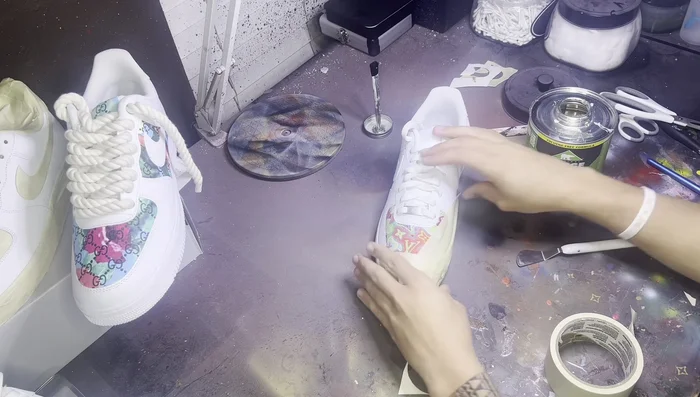 Secure with tape (optional): For better adhesion while the glue dries, apply additional tape over the leather, pressing firmly around the edges.