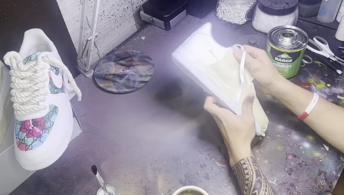 Remove securing tape and final press: After about 10 minutes, peel off the securing tape. Press down firmly on all edges for the final time.