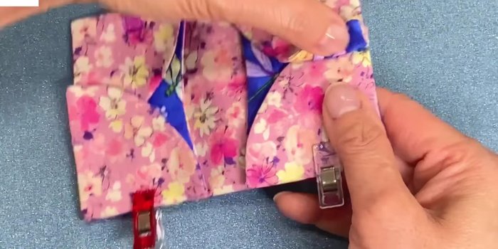 Attach elastic: Find the center, place elastic ends on center mark and clip. Topstitch around elastic, keeping layers even.