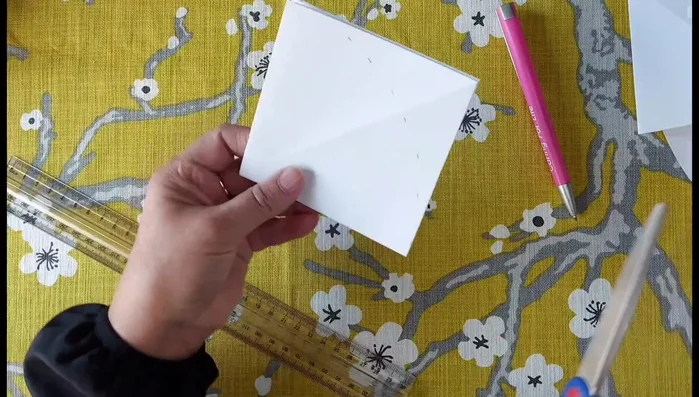 Cut along the curved line you've marked.