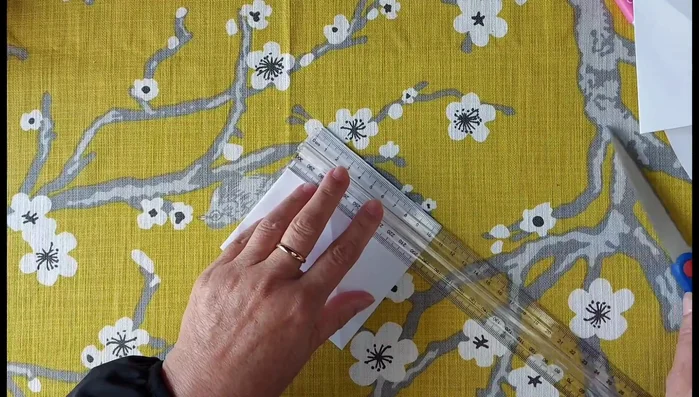 Create a smooth curve between your 75cm marks. Make several small marks in between to help guide your cutting line.