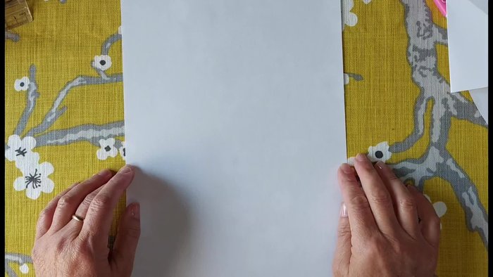Cut off the excess length of fabric to create a 150cm x 150cm square.