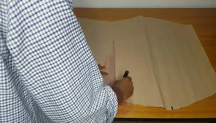 Mark the hip and knee lines on the front pattern pieces for layering. Extend these lines for alignment.