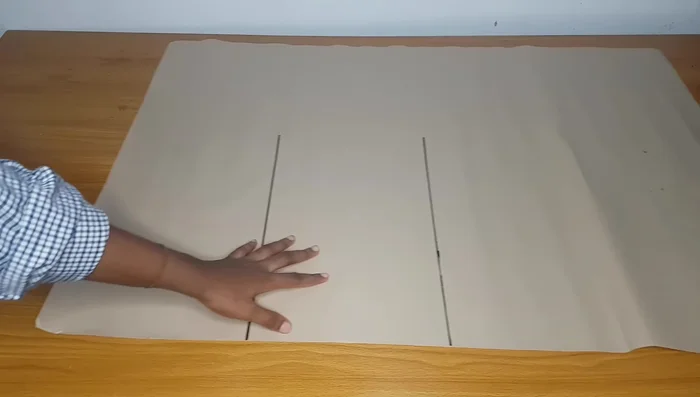 Draft the front pattern piece on pattern paper, including waistline, hipline, knee line, and full length. Add seam allowance.