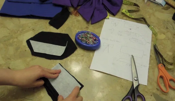 Turn the sewn pieces inside out to create tubes. This forms the main body of the bow.