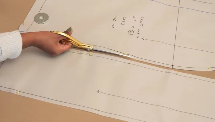 Cut out fabric pieces using the pattern from the pattern tutorial. This includes the main jacket pieces, lining pieces, pockets, and other details.