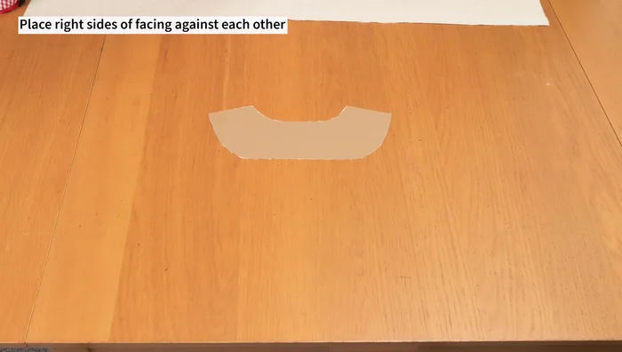 Pin and sew the collar to the jacket neckline, sandwiching it between the jacket and facing. Sew the center front edges, connecting lining to jacket.