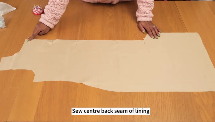 Stitch the lining pieces together, leaving the bottom vent opening unstitched.