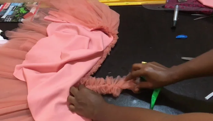 Gather sleeves: Gather the sleeves using the same gathering method as the main fabric.