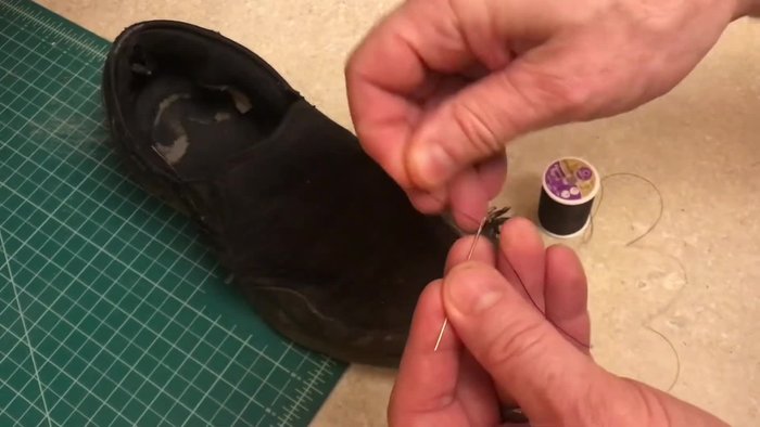 Thread the needle and create a knot. A quick knotting technique is to wrap the thread around your finger a couple of times, roll it, and pull to create a secure knot.