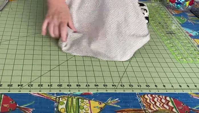 Close the opening left for turning. Topstitch around the top of the bag, about 3 inches down, for a clean finish.