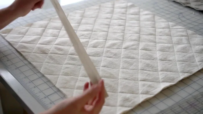 Repeat Step 12 for the other quilted piece.