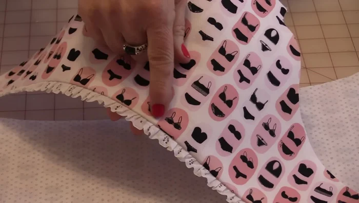 Fold and sew the top piece to the inside of the bag.