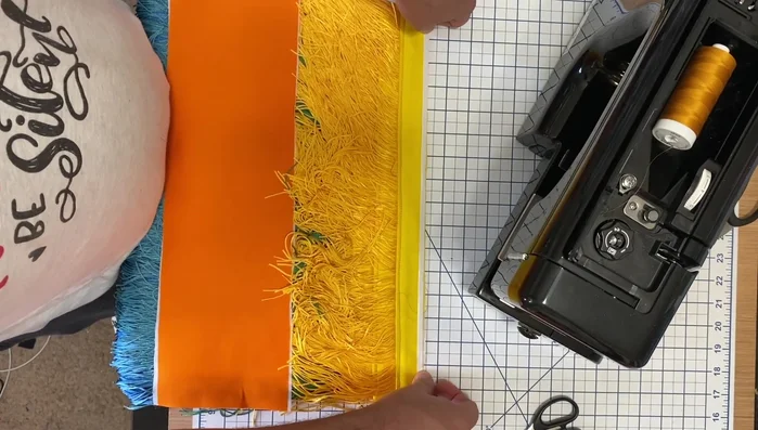 Heat set the wonder tape with an iron to ensure strips stay in place.