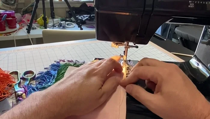 Use a zigzag stitch to prevent fraying along the raw edges.