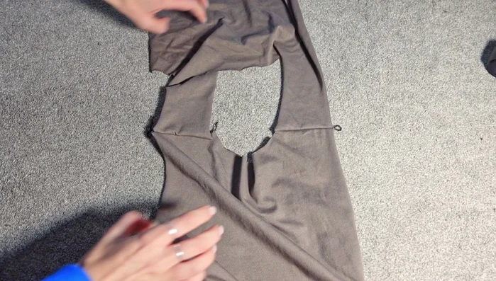 Attach the facing pieces to the dress pieces to finish the neckline. Sew along the entire neckline with right sides together, then pull the facing through.