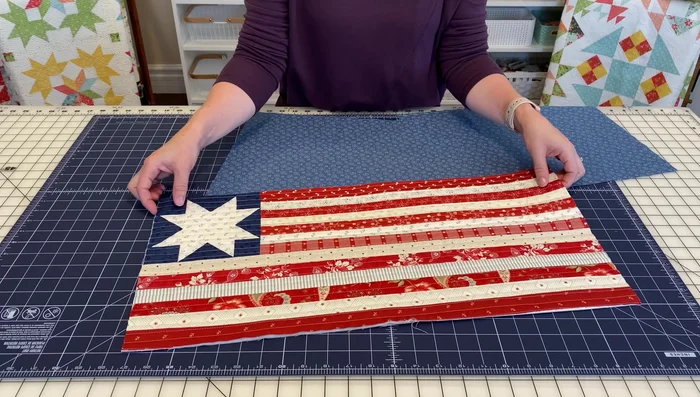 Cut two backing fabric pieces. Each piece should be the same width as your pillow front (12 inches in this case) and 16 inches long, creating a generous overlap.