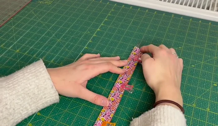 Flip the fabric and sew the other edge (1/8 inch from the edge).