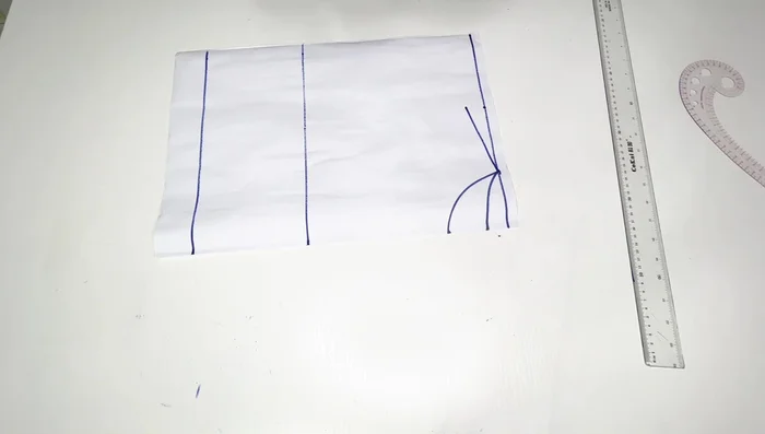 Place half your nipple-to-nipple measurement on the bust line and waistline, then connect these points. Add half an inch on each side and connect to form the bust dart.